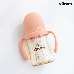 UBMOM No-Spill Sippy Cup with 360-degree rotating handles supports comfortable grip during playtime.