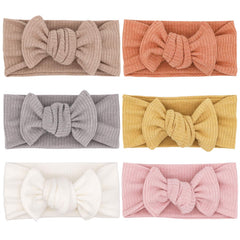 UeeSum dusty rose headband bow with soft stretch for comfy newborn wear