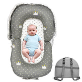 UGRASEA baby lounger folded into backpack mode for travel convenience