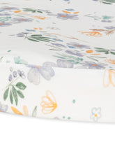 Under The Nile bassinet sheet Daisy closeup highlighting soft organic cotton for breathable nursery comfort.