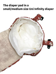 Uni Infinity easy-clean liners demonstrate quick, mess-free diaper changes.
