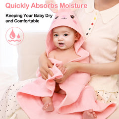 Baby wrapped in Unicorn Castle hooded towel for a calm bath-time snuggle
