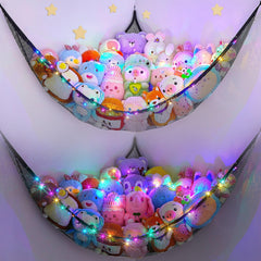 Unicorn Castle LED toy hammock glows in a kid's room, adding cozy storage.