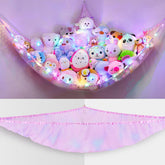 Unicorn Castle stuffed animals hammock with LED light for playful storage.