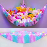 Unicorn Castle stuffed animals hammock in pink-blue-purple stores plush toys neatly.