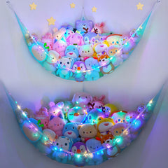 Unicorn Castle stuffed animals hammock in blue offers space-saving corner storage for kids.
