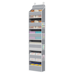 Univivi door hanging organizer on a nursery door with roomy compartments for baby bottles and toys.