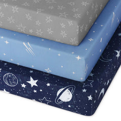Unnivoll blue-gray planet sheets fit 38x26 crib mattresses securely for a calm sleep.