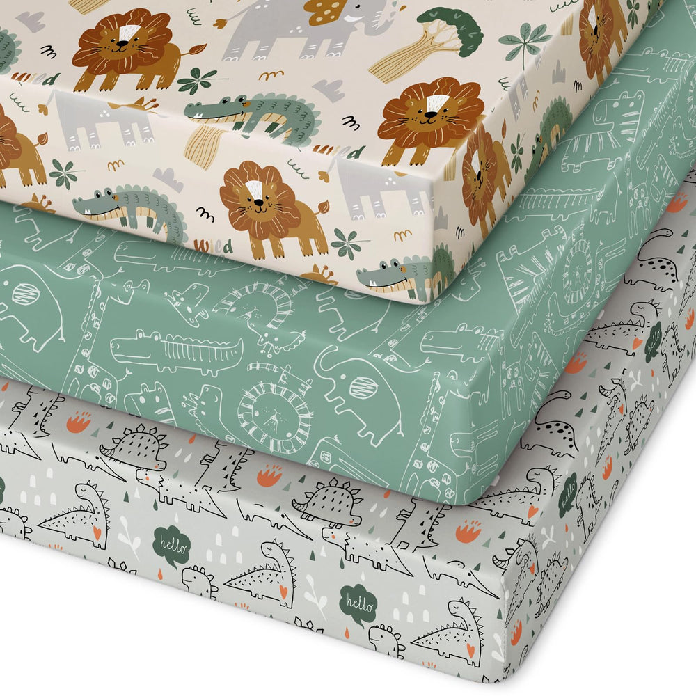 Unnivoll pack-n-play sheet green lion print closeup, showcasing a soft microfiber and snug fit