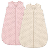 Unnivoll sleep sack with plush dots in apricot-pink provides cozy security for baby during bedtime
