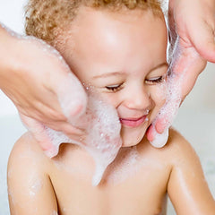 UOUYOO waterproof wrap on baby ears providing barrier during shower