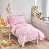 UOZZI BEDDING 4-piece pink toddler set with ruffle comforter for cozy sleep.
