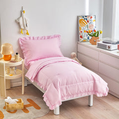 UOZZI BEDDING 4-piece pink toddler set with ruffle comforter for cozy sleep.
