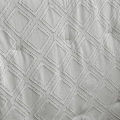 UOZZI BEDDING crib sheet closeup demonstrates secure fit for standard crib mattresses.