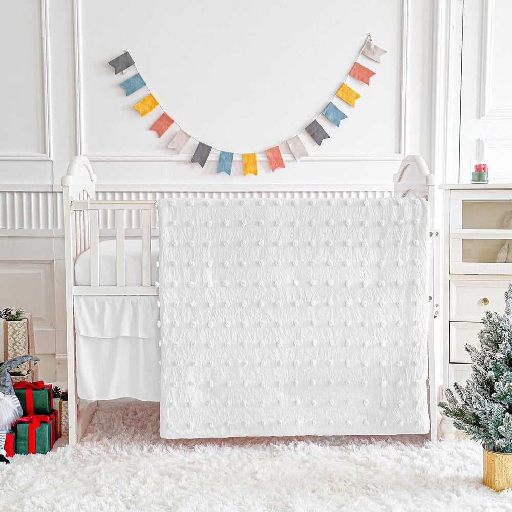 UOZZI Bedding mini crib 3pc set in white offers soft, breathable comfort for baby's nap