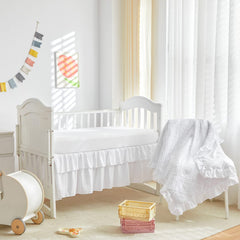 UOZZI BEDDING bed skirt with ruffle adds tidy nursery detail