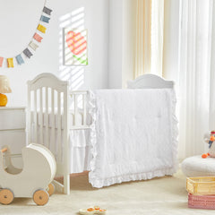 UOZZI BEDDING mini crib comforter with ruffle creates cozy naps for baby
