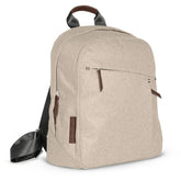 UPPAbaby Declan changing backpack front view shows coordinated leather accents for stroller-ready style.