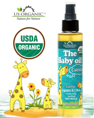 US Organic Baby Oil jojoba-oil-drop demonstrates nourishing jojoba for soft, smooth skin.