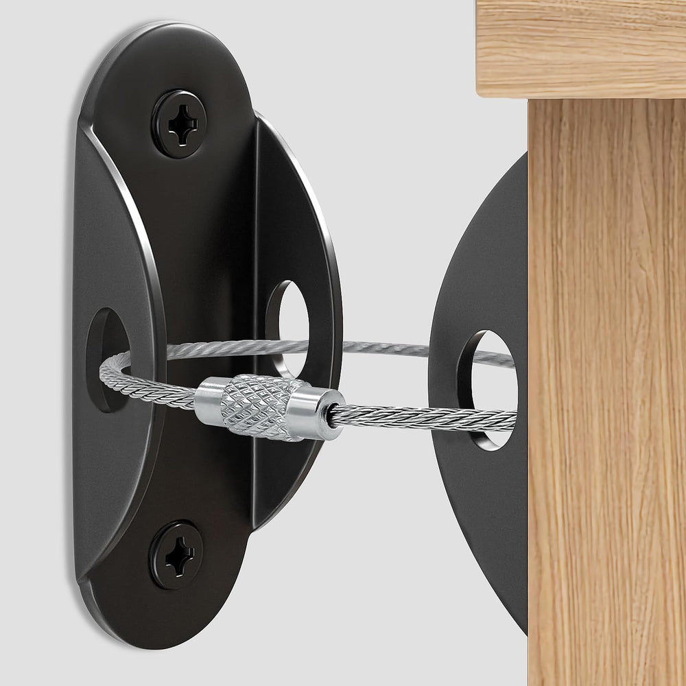 Utook furniture anchors in black securing a bookshelf to the wall against tipping