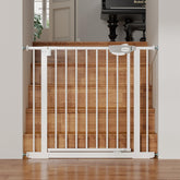 UWRVH Auto-Close Baby Gate on stairs shows a sturdy steel frame for safety.