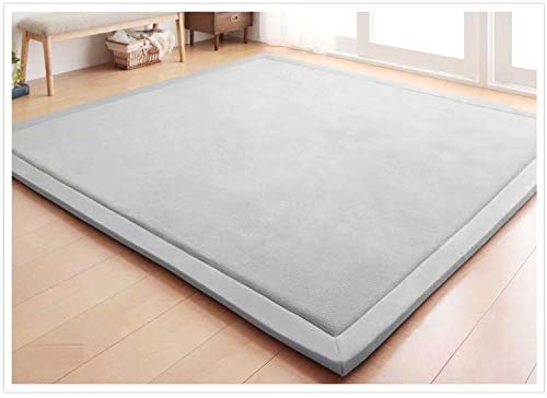 V-mix Baby Play Mat plush-foam close-up shows soft cushioning for babies.