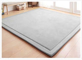 V-mix Baby Play Mat plush-foam close-up shows soft cushioning for babies.