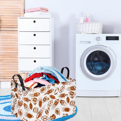 VAIVUSTO Rec football print bin with towels illustrates practical nursery organization.