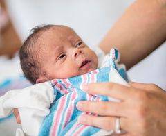 Vakly baby-swaddled blanket 40x30 in use for secure wrapping and comfort