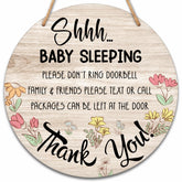 Valucise baby sleeping sign front door round—quiet time cue for visiting family.