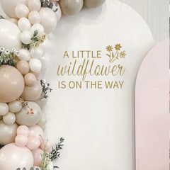 VANGNING A Little Butterfly on the Way decal sign highlights anticipation for a baby shower.