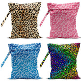 VBCVBGFH neon leopard wet bag folded for compact travel organizing.