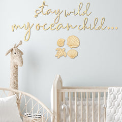 Vercraft assembled wall decor forms a serene nursery focal point for kids' rooms.