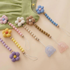 Verxcty pacifier clip on clothing demonstrates secure hold without leaving marks