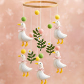 Vicenpal Silly Goose mobile for crib, front view with pink and yellow felt shapes.
