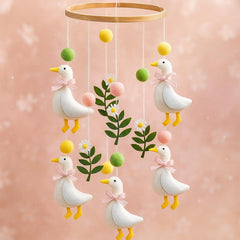 Vicenpal Silly Goose mobile for crib, front view with pink and yellow felt shapes.