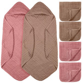 VitalCozy hooded baby towel on display, soft muslin fabric for quick warmth after bath.