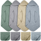VitalCozy hooded baby towel in light green ready for post-bath warmth and absorbent comfort