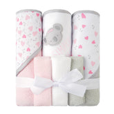 Viviland hooded towel with pink koala design keeps baby cozy after bath.