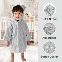 The voova movas bear-ear hooded towel sits on a newborn, cozy and cute.