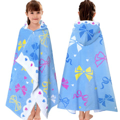 VOOVA & MOVAS hooded towel with bow design, kid-friendly beach fashion.