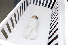Vusee no-drill wall shelf for baby monitor organizes cords and saves wall space.