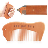 VZZNN birthing comb closeup shows mahogany wood and smooth finish for gentle labor support.