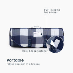 Wake In Cloud cot nap mat with integrated blanket provides cozy nap-time warmth.