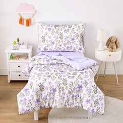Wake In Cloud floral toddler bedding set in purple and white brightens a girl's room for cozy bedtime.