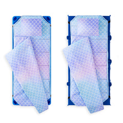 Wake In Cloud nap mat rolled with hook and loop strap for portable daycare travel.