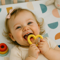 WANG BAO Valentine teether texture close-up shows soft bumps for massaging gums.