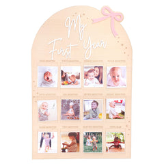 WAUAO Bow First Year Birthday Board closeup showing carved wood detail for nursery decor