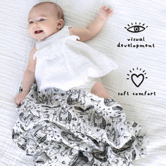 Wee Gallery forest animals swaddle black and white pattern promotes visual focus and stimulation.