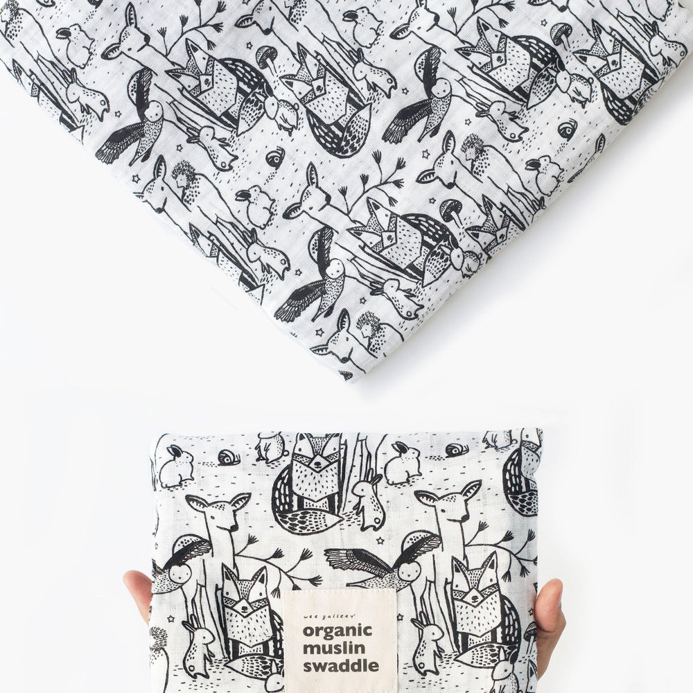 Wee Gallery forest animals swaddle close-up texture, breathable organic cotton for gentle comfort.